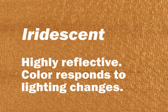 Iridescent. Highly reflective. Color responds to lighting changes.